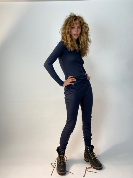 one piece navy ribbed cotton long johns be cool stay warm its all the same! in your navy unitard. Charlie is wearing a size medium for an easy comfy fit.....